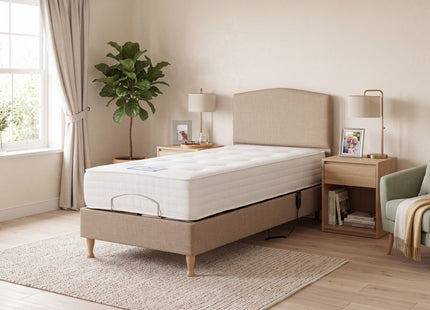 Upholstered electric adjustable bedstead in a neutral bedroom